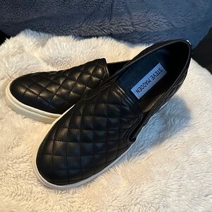 Steve Madden Black Quilted Loafers.